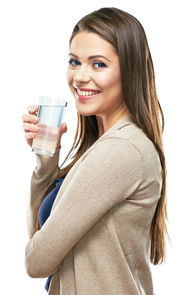 Woman holding a clear glass of water
